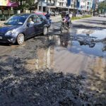 The badly-damaged Kaloor-Kadavantra road;