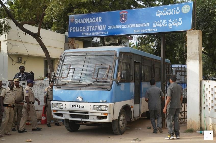 A police van carrying four men accused of the alleged rape and murder of a 27-year-old woman, leaves a police station in Shadnagar, on the outskirts of Hyderabad, November 30, 2019.