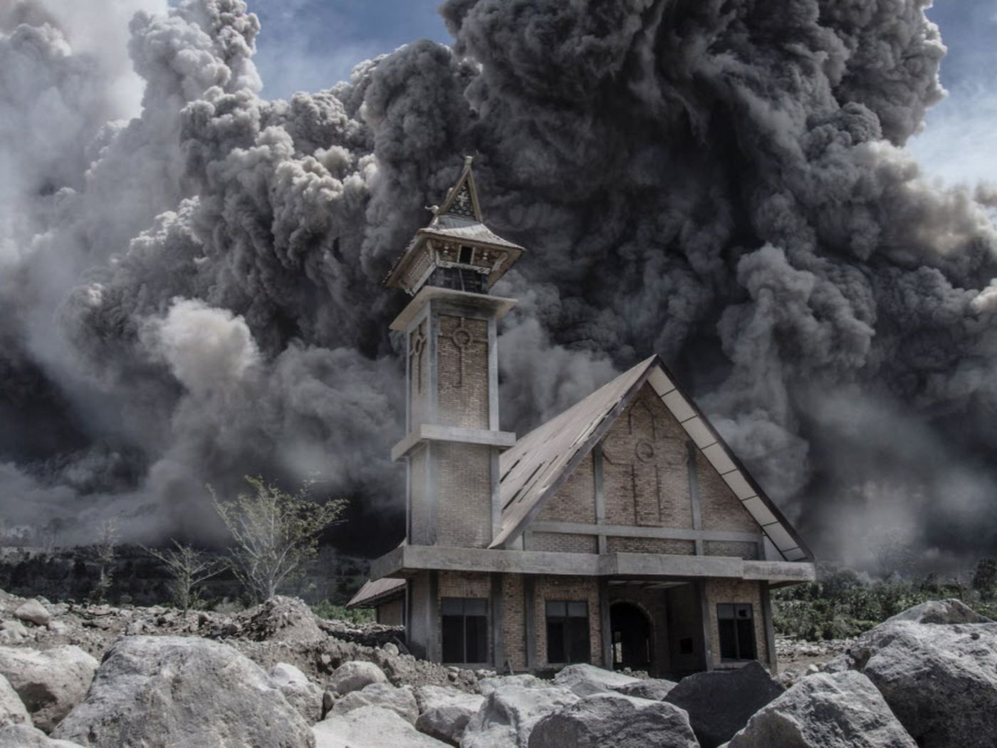 Sinabung volcano spews volcanic ash during eruption in Karo, North Sumatra province, Indonesia August 10, 2020 in this still image obtained from social media.