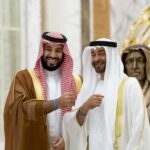 Sheikh Mohamed bin Zayed and Prince Mohamed bin Salman bin Abdulaziz pose for a photo wearing Expo 2020 wristbands at Qasr Al Watan during the Crown Prince's visit to Abu Dhabi in November, 2019. Hamad Al Mansoori / for the Ministry of Presidential Affairs