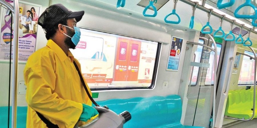 A worker carrying out disinfection inside a Metro coach recently.