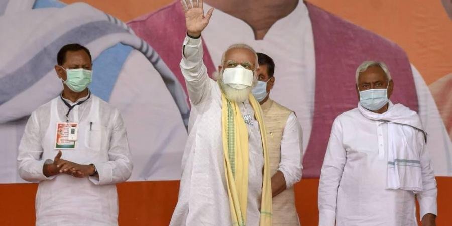 Prime Minister Narendra Modi with Bihar Chief Minister and Janta Dal-United President Nitish Kumar during an election rally in Sasaram Friday Oct. 23 2020.