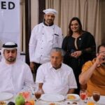 Kerala Chief Minister (Seated front row) with Kerala gold scam accused Swapna Suresh (Behind in black dress) during an official meeting with UAE diplomats
