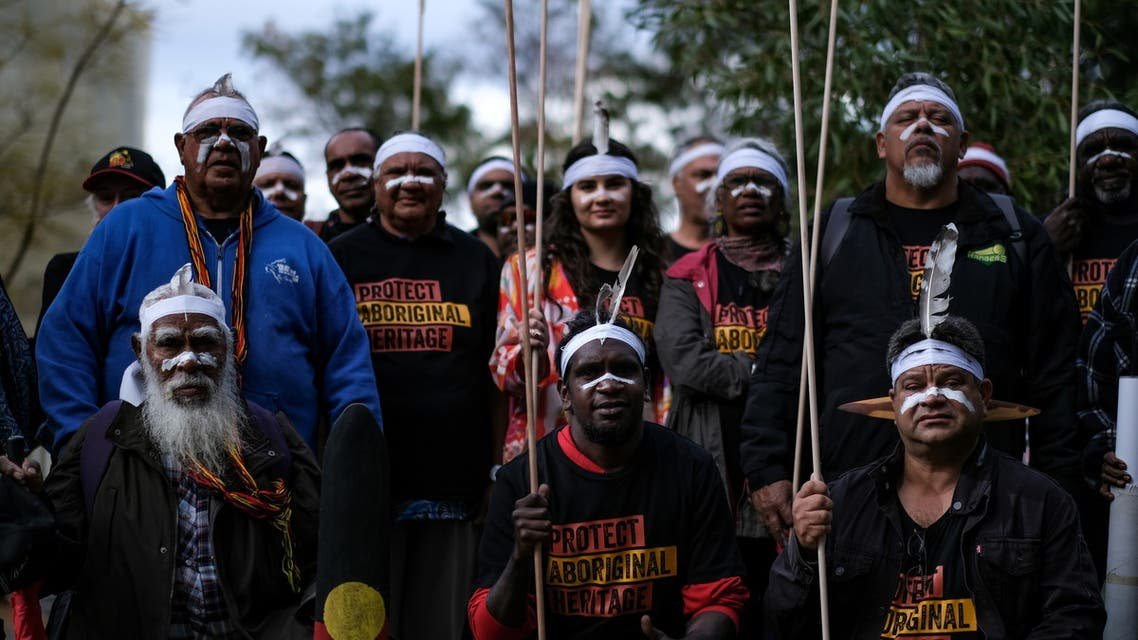 Aboriginal groups' members take part in a protest against what they say is a lack of detail and consultation on new heritage protection laws, after the Rio Tinto mining group destroyed ancient rock shelters for an iron ore mine last year, in Perth, Australia August 19, 2021.
