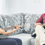 The 73-year-old VT Thomas continues to wield his guitar skillfully, teaching many students in the vicinity