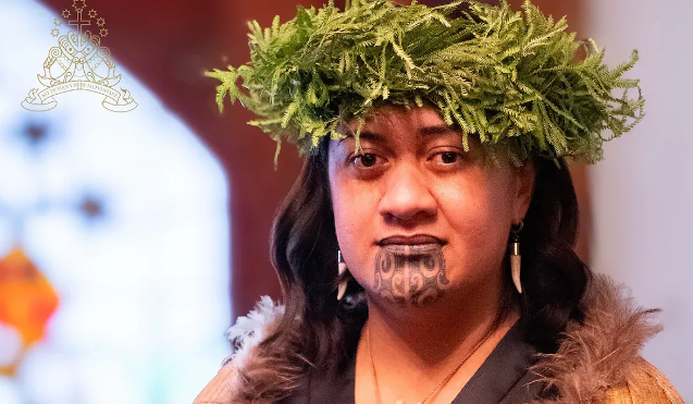 Nga Wai Hono i te po Paki in traditional Maori dress, including fern headdress and carved whalebone necklace, during her coronation ceremony.