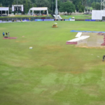 Pathik Sports Complex, Greater Noida, with unplayable wet patches, causing delays in Afghanistan vs. New Zealand Test.
