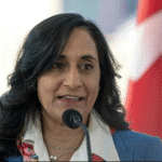 Anita Anand, newly appointed Canada’s first Hindu Foreign Minister, smiles during a press briefing.