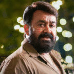 Mohanlal's Thudarum movie poster celebrating its entry into the 100 crore club at the Indian box office.