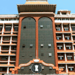 Kerala High Court building in Ernakulam, where ruling on aided school property was issued.