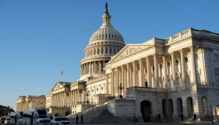 U.S. President Donald Trump speaks to press as he arrives at the White House in Washington, D.C., November 9, 2025.