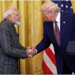 Donald Trump and PM Narendra Modi shaking hands during a diplomatic meeting, smiling and discussing bilateral relations.